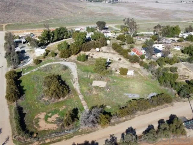 27640 Smith Road, Unit 1 Winchester, CA 92596 - Photo 5 of 6 a view of a lot of trees in a yard