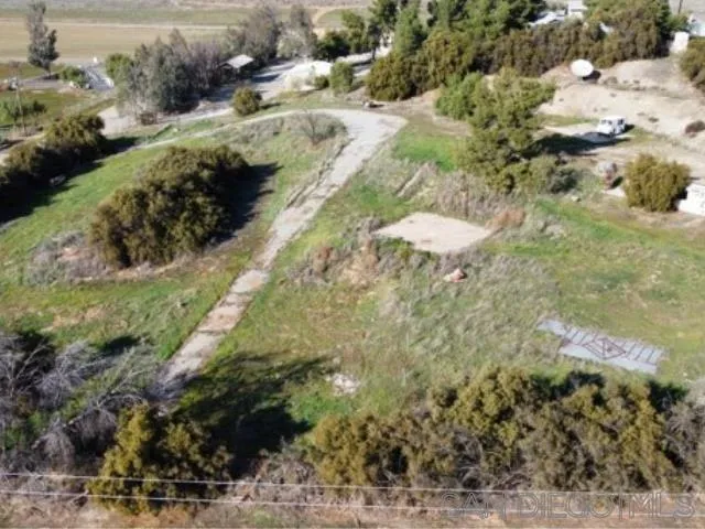 27640 Smith Road, Unit 1 Winchester, CA 92596 - Photo 6 of 6 a view of a street with a yard