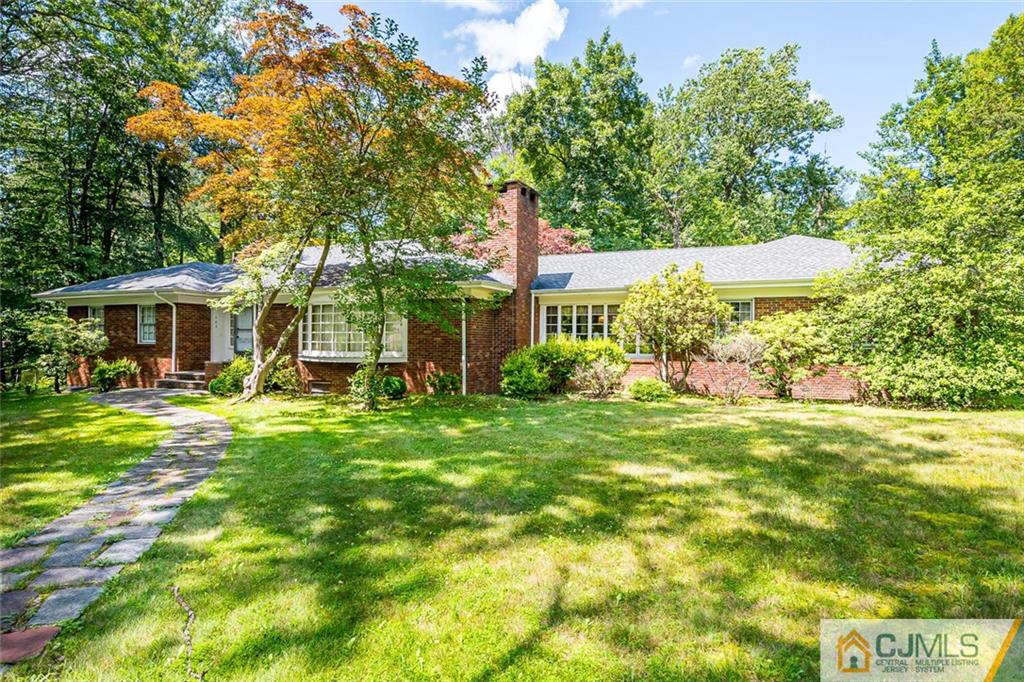 305 Ridge Road Watchung, NJ 07069 - Photo 1 of 41 a front view of a house with a yard