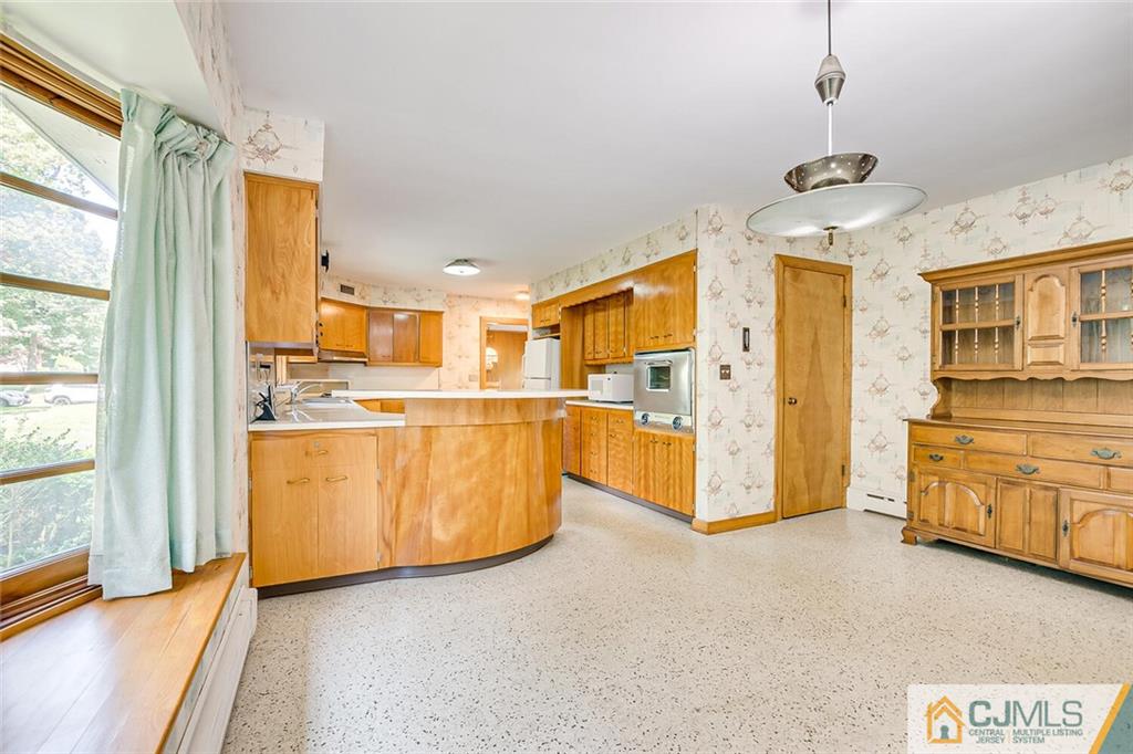 305 Ridge Road Watchung, NJ 07069 - Photo 20 of 41 a view of a kitchen with furniture and a window