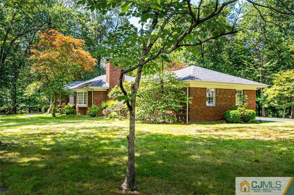 305 Ridge Road Watchung, NJ 07069 - Photo 35 of 41 a front view of a house with a yard