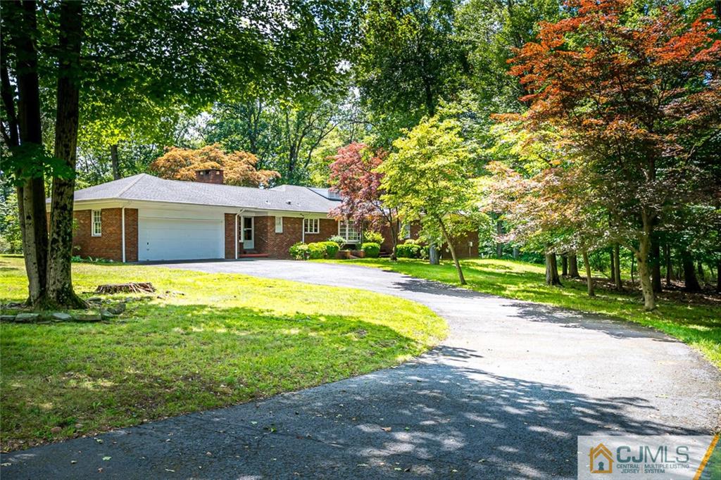 305 Ridge Road Watchung, NJ 07069 - Photo 36 of 41 a front view of a house with yard and green space