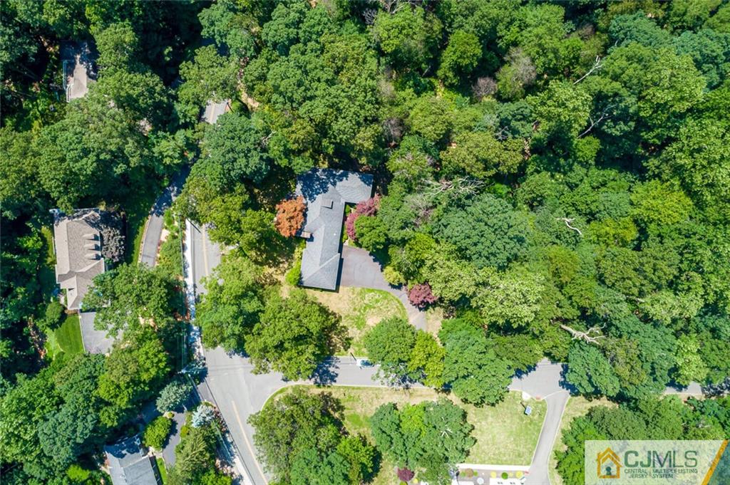 305 Ridge Road Watchung, NJ 07069 - Photo 40 of 41 an aerial view of a house with a yard and outdoor seating