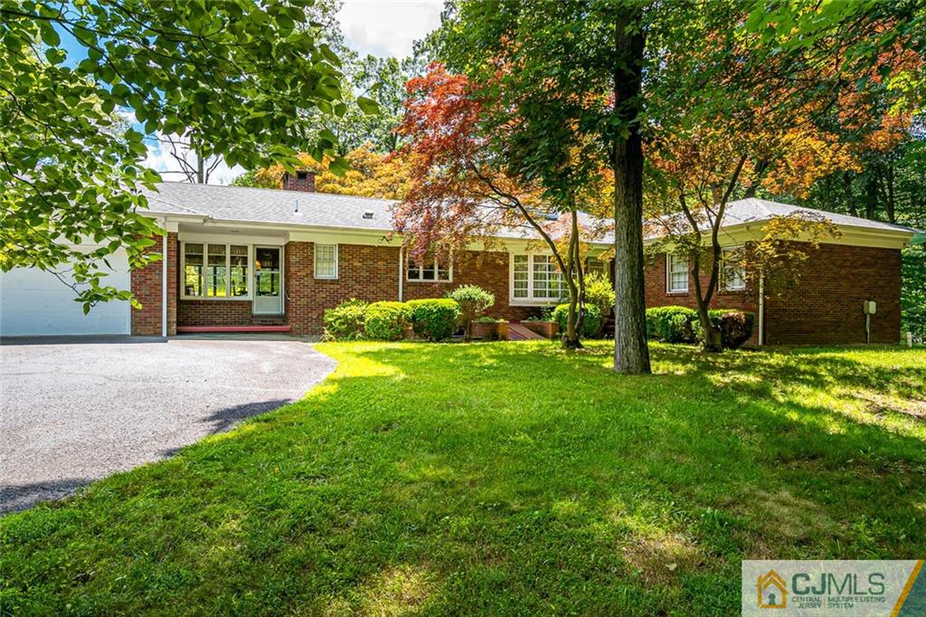 305 Ridge Road Watchung, NJ 07069 - Photo 4 of 41 a front view of a house with garden