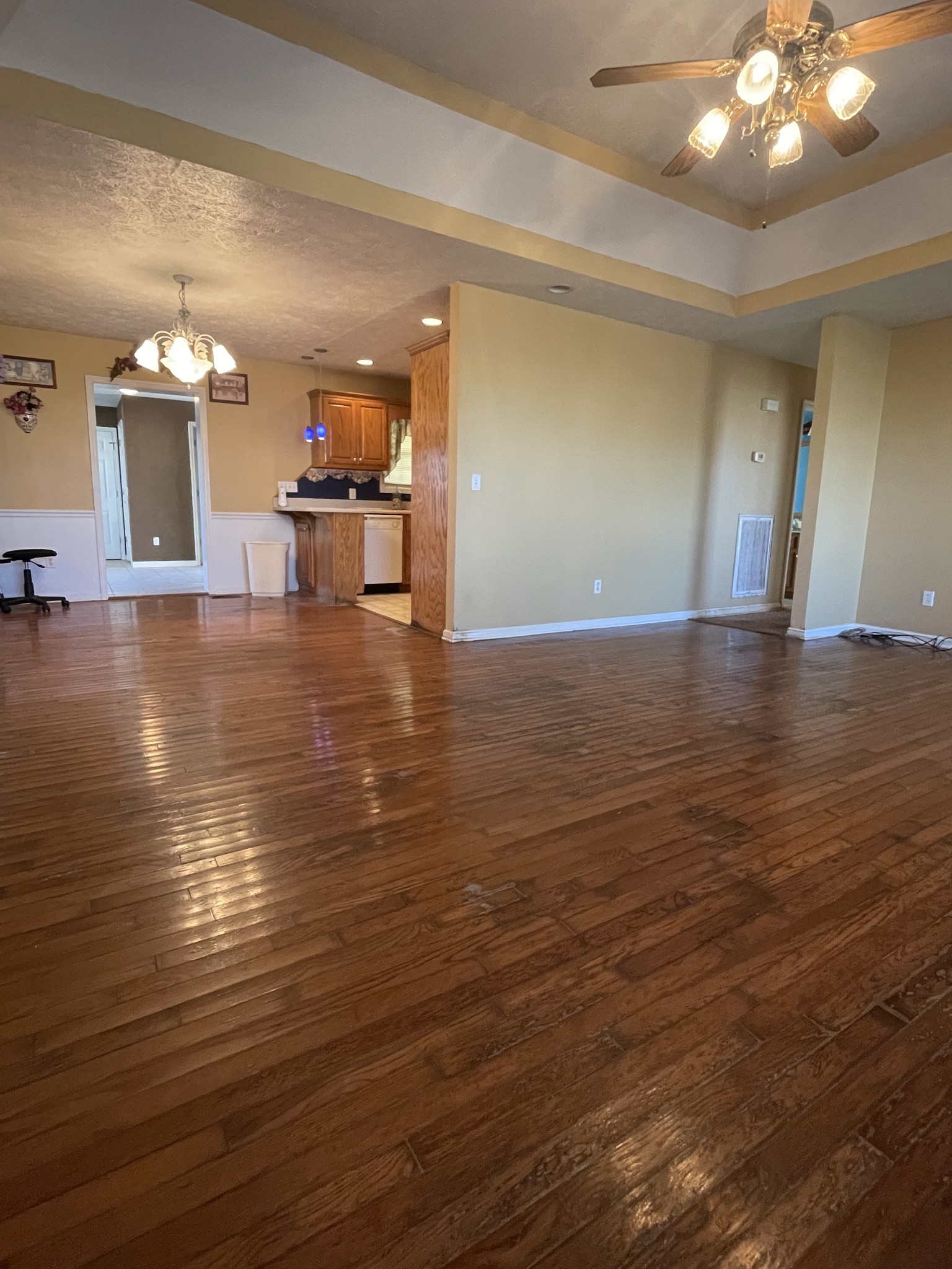 140 Dixon Road Lafayette, TN 37083 - Photo 20 of 30 a view of a living room a kitchen island a stove and wooden floor