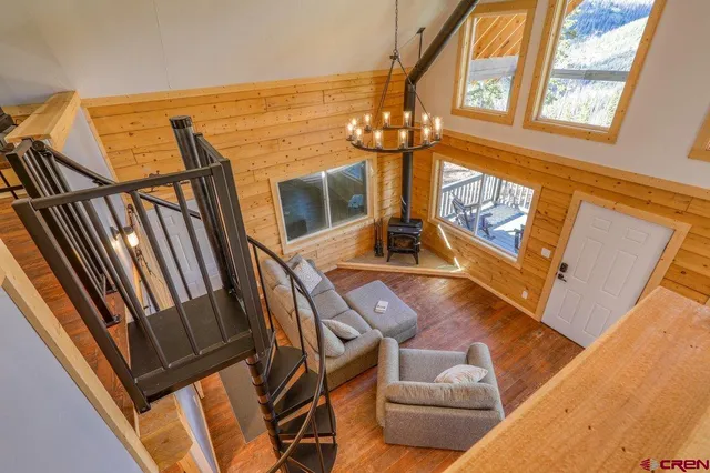 a view of living room with furniture and a window