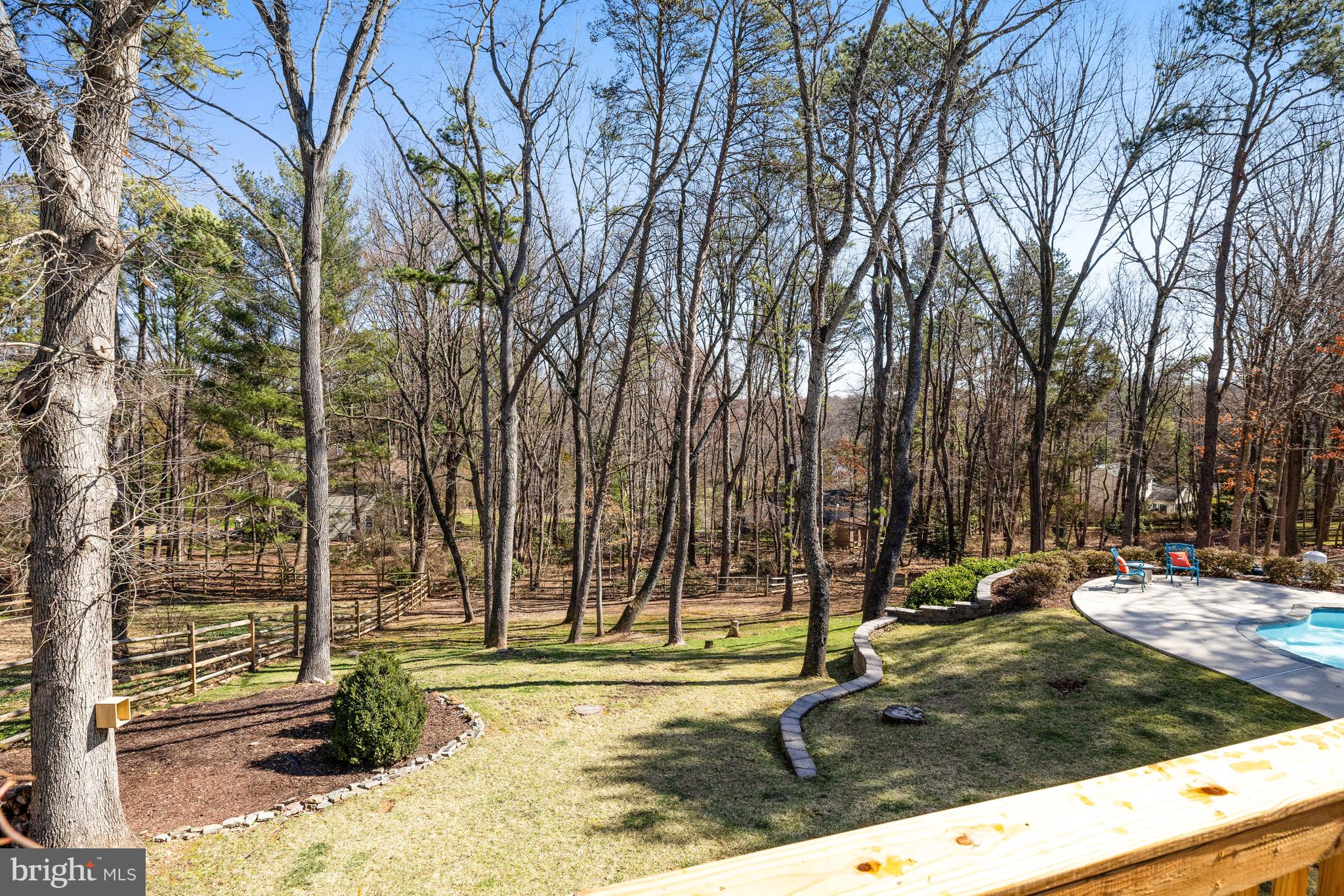 1807 Post Oak Trail Reston, VA 20191 - Photo 36 of 79 a view of a yard with large trees