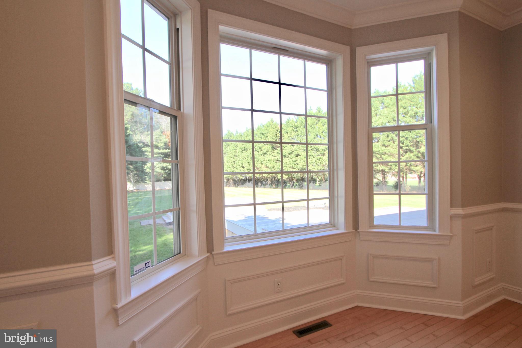 24 Mapledale Road Dover, DE 19904 - Photo 16 of 57 Bay Window overlooks Deck and Backyard