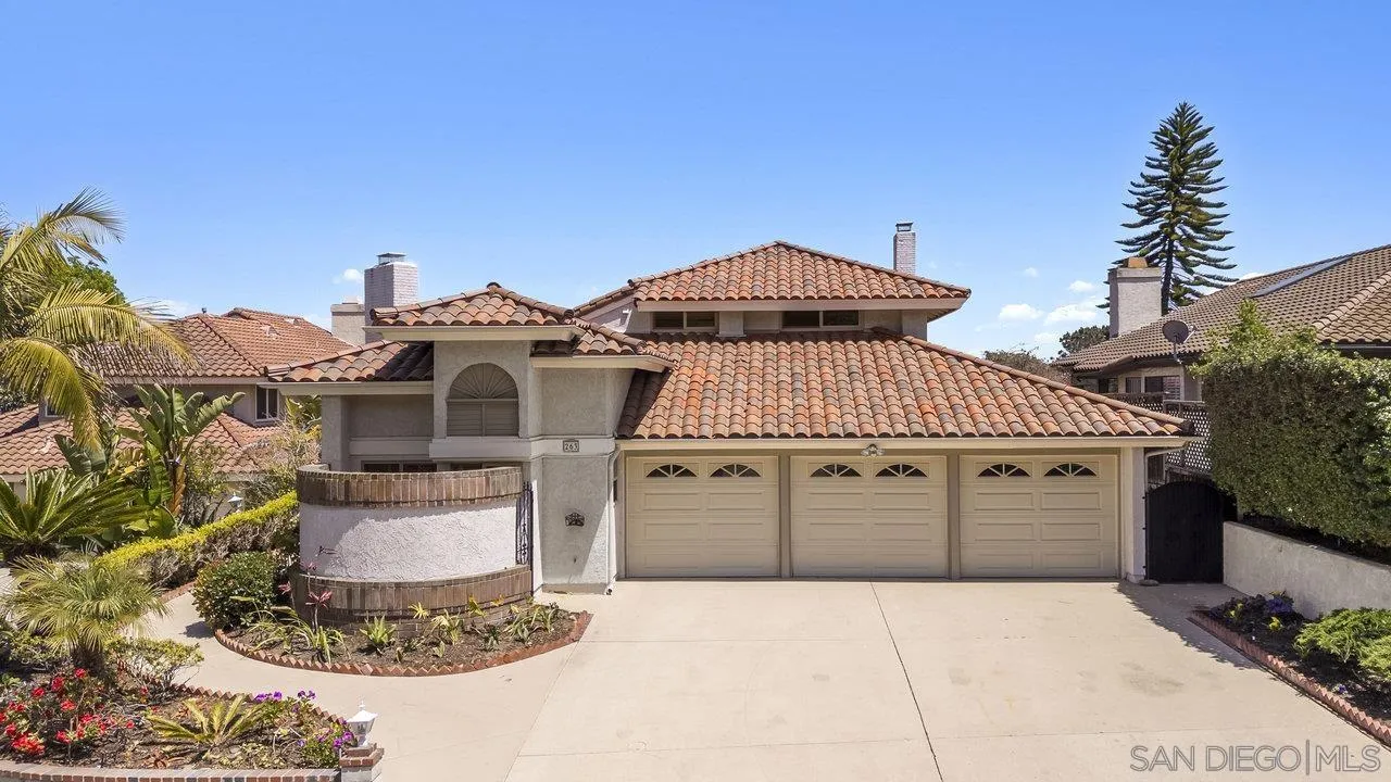 263 Via Villena Encinitas, CA 92024 - Photo 2 of 49 a front view of a house with a yard