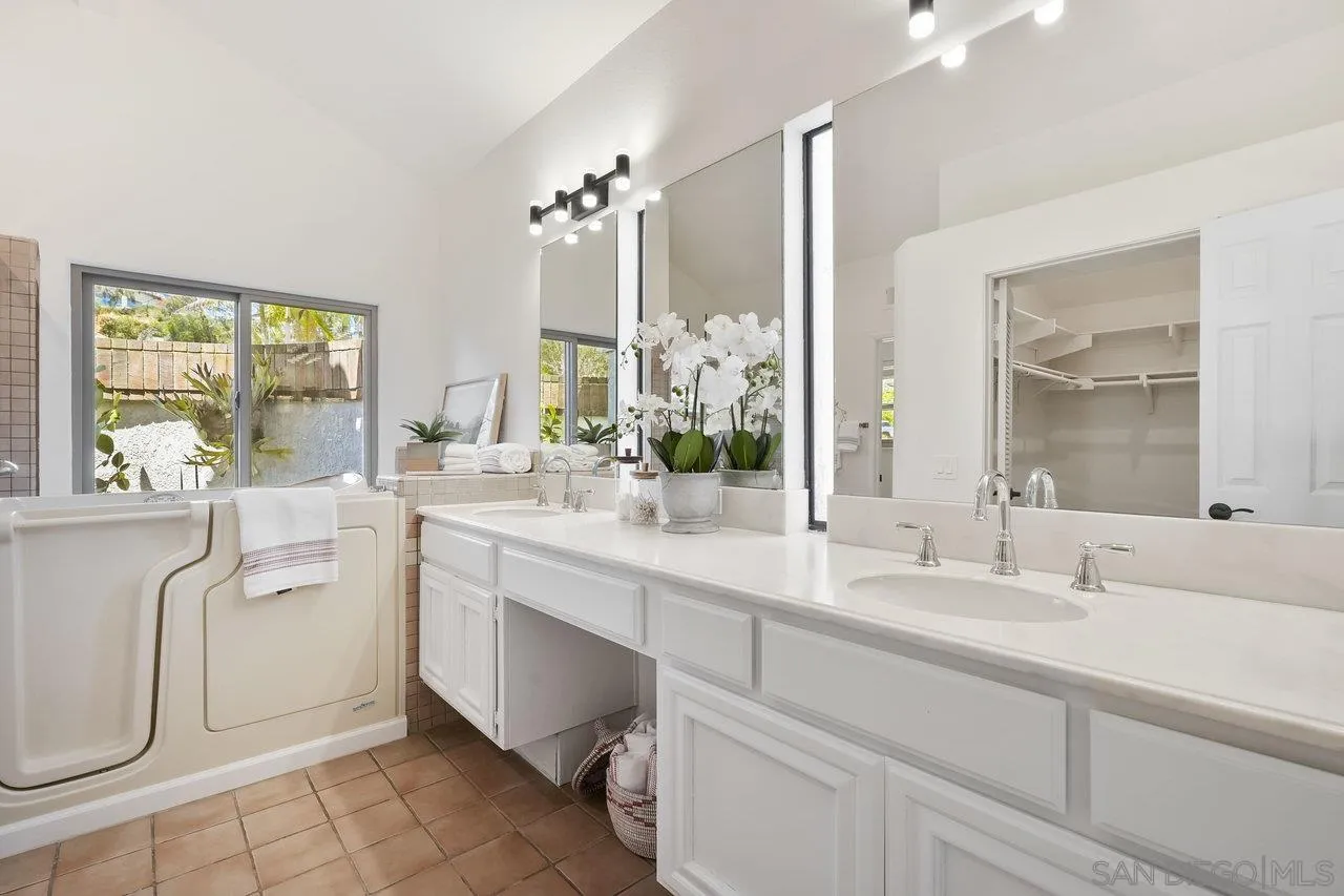 263 Via Villena Encinitas, CA 92024 - Photo 21 of 49 a bathroom with a double vanity sink mirror and