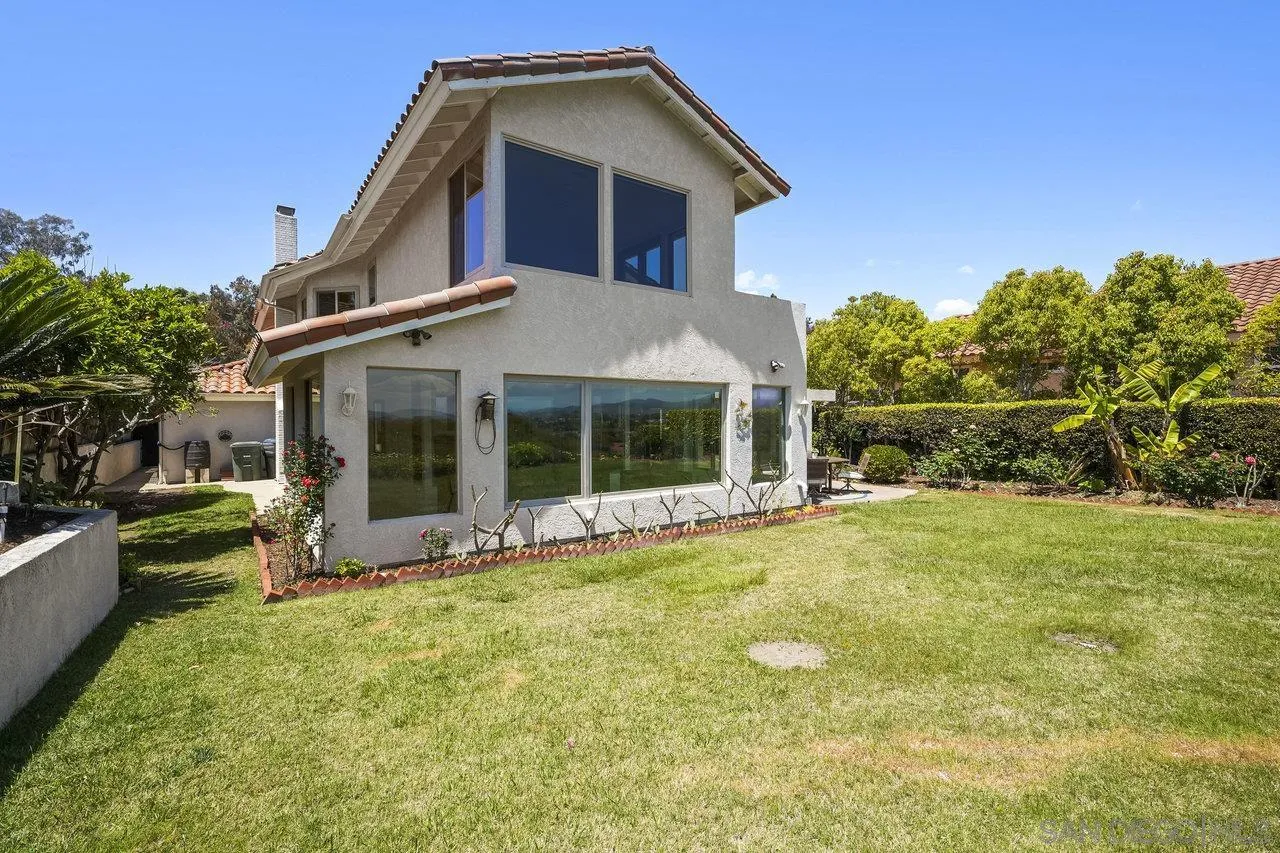 263 Via Villena Encinitas, CA 92024 - Photo 36 of 49 a front view of a house with a yard