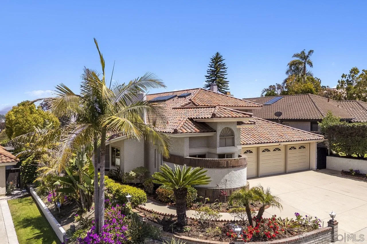 263 Via Villena Encinitas, CA 92024 - Photo 39 of 49 a front view of a house with a yard