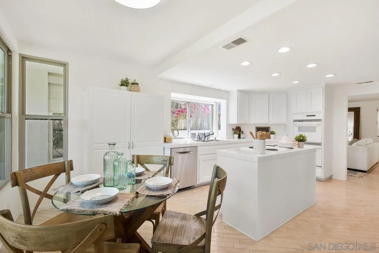 263 Via Villena Encinitas, CA 92024 - Photo 10 of 49 a living room with furniture and kitchen view