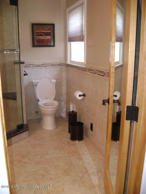 65 Skidmore Road Freehold, NJ 07728 - Photo 20 of 32 a bathroom with a toilet
