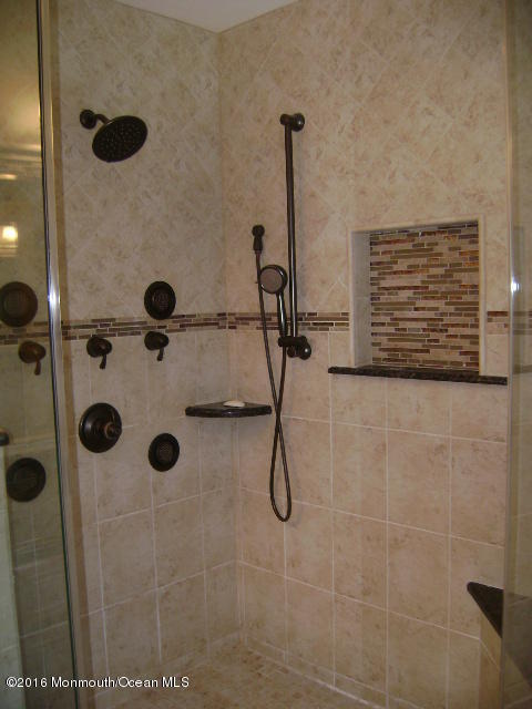 65 Skidmore Road Freehold, NJ 07728 - Photo 23 of 32 a bathroom with a shower