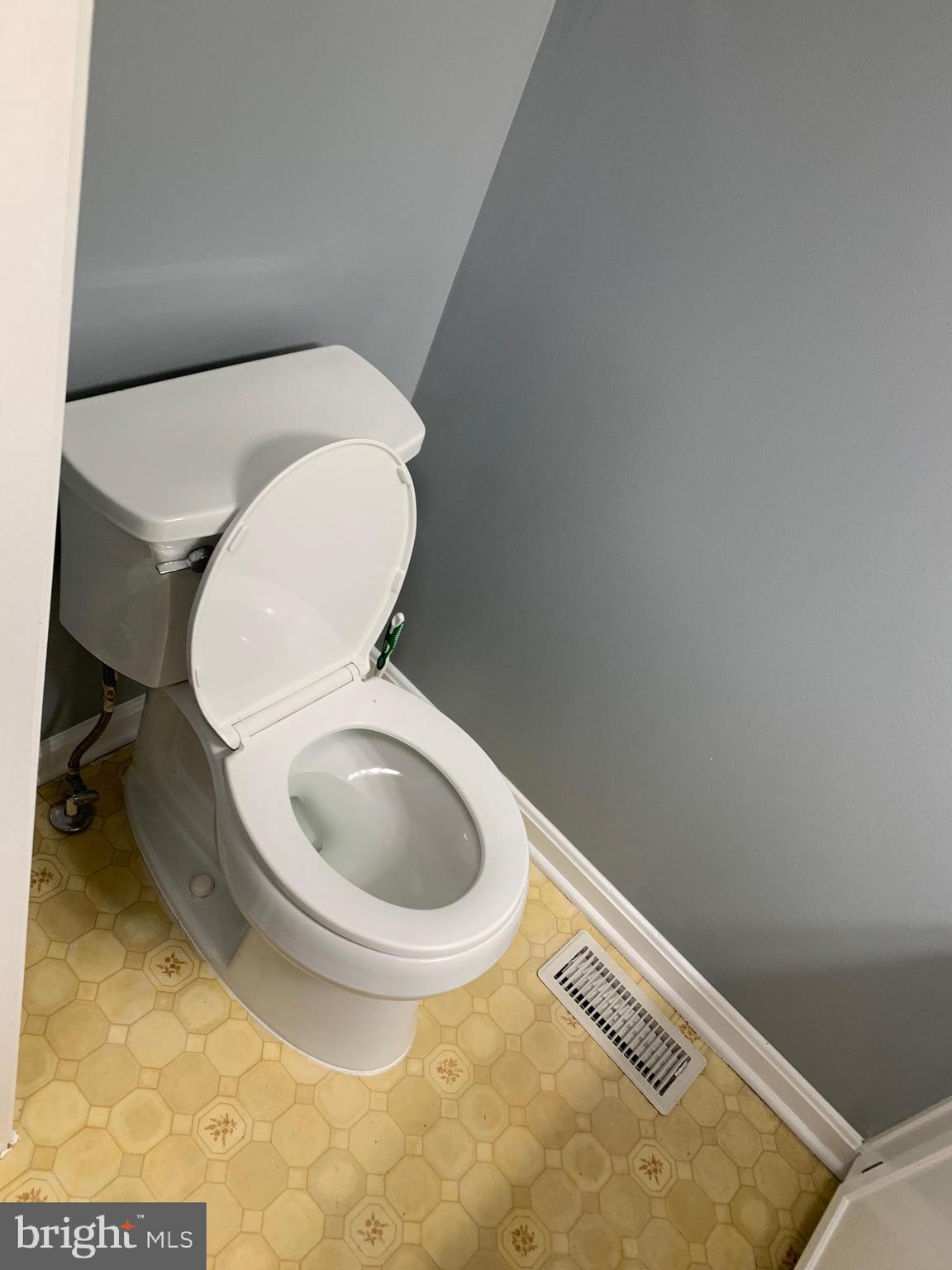 8555 Ritchboro Road District Heights, MD 20747 - Photo 26 of 30 a bathroom with a toilet and a sink