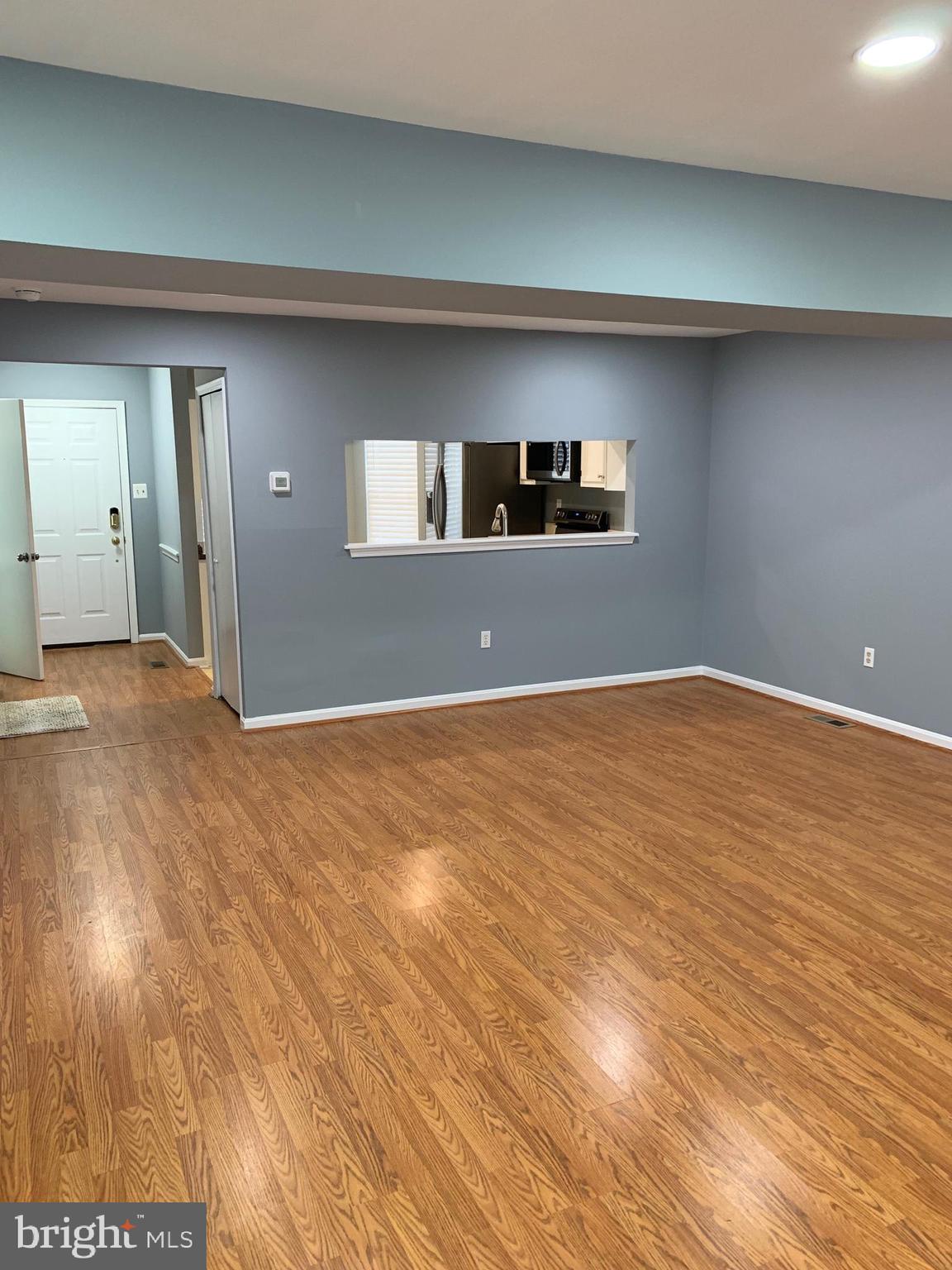 8555 Ritchboro Road District Heights, MD 20747 - Photo 29 of 30 a view of empty room with wooden floor