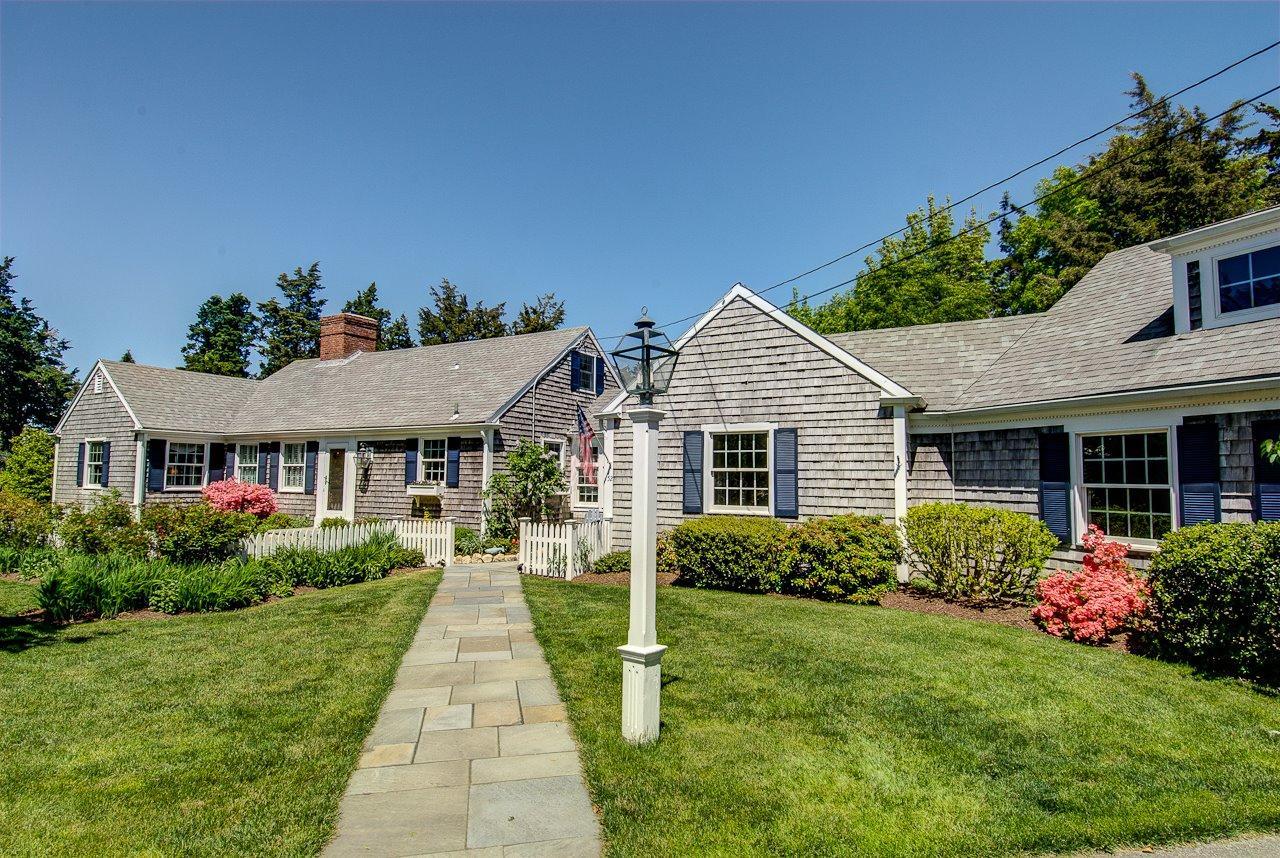 a view of a house with garden