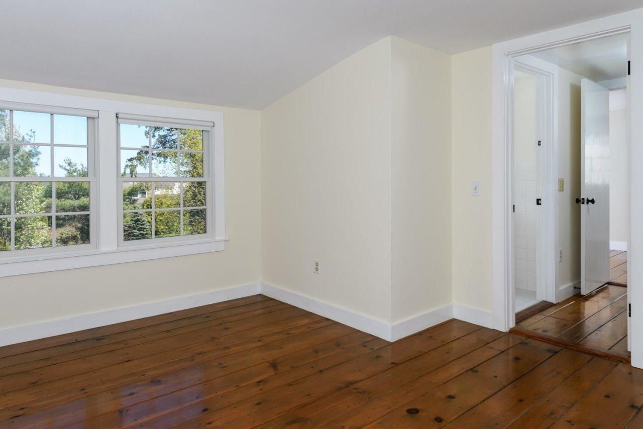 52 Salten Point Road Barnstable, MA 02630 - Photo 20 of 24 a view of a bedroom with wooden floor and front door