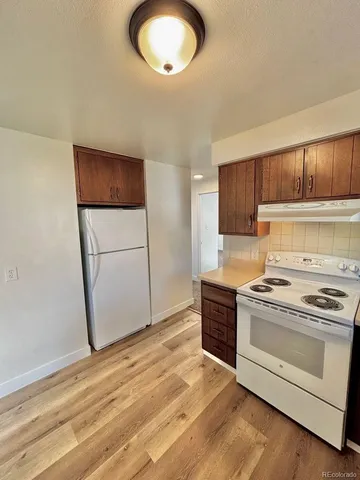 a view of a room that has a window