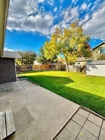 a view of an swimming pool with an outdoor space