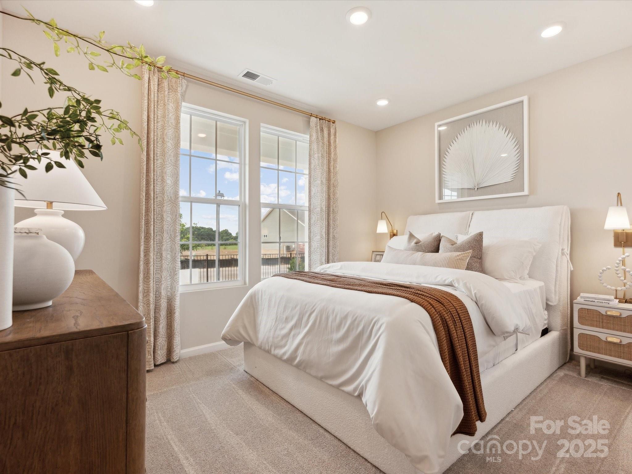 2012 Rosefield Court Matthews, NC 28104 - Photo 11 of 14 a bedroom with a large bed and a window