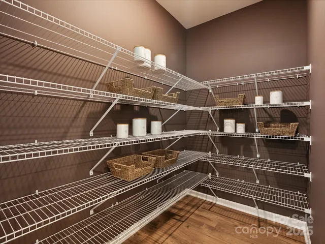 a living room with fireplace furniture and a flat screen tv