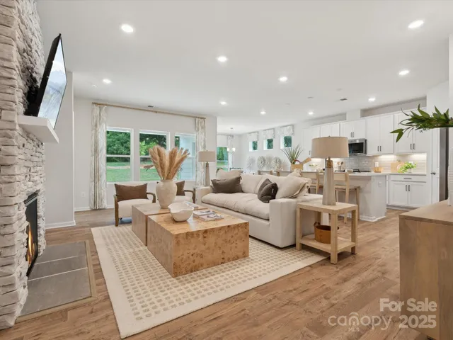 a dining room with wooden floor and window
