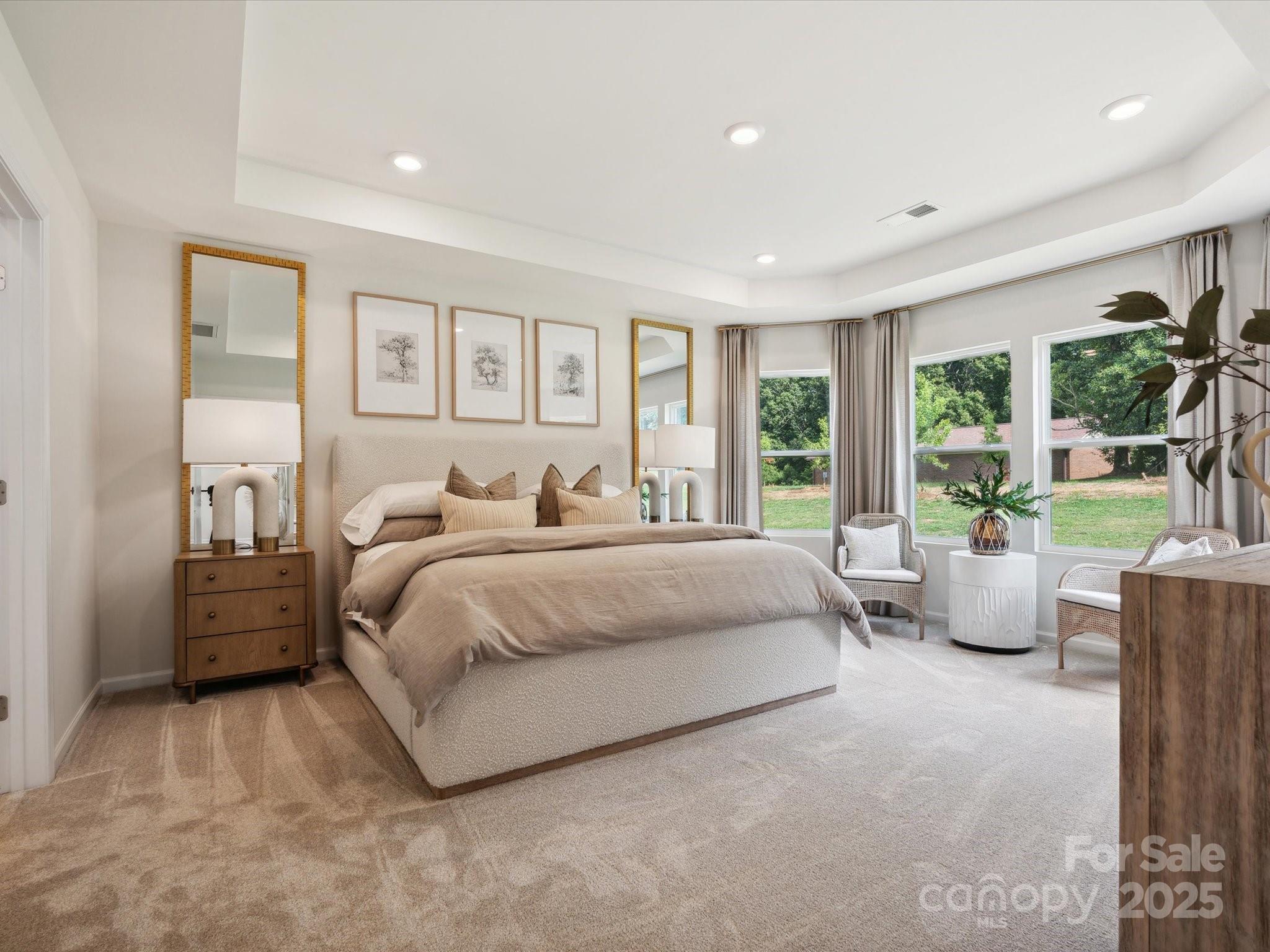 2012 Rosefield Court Matthews, NC 28104 - Photo 8 of 14 a bedroom with a large bed and a large window