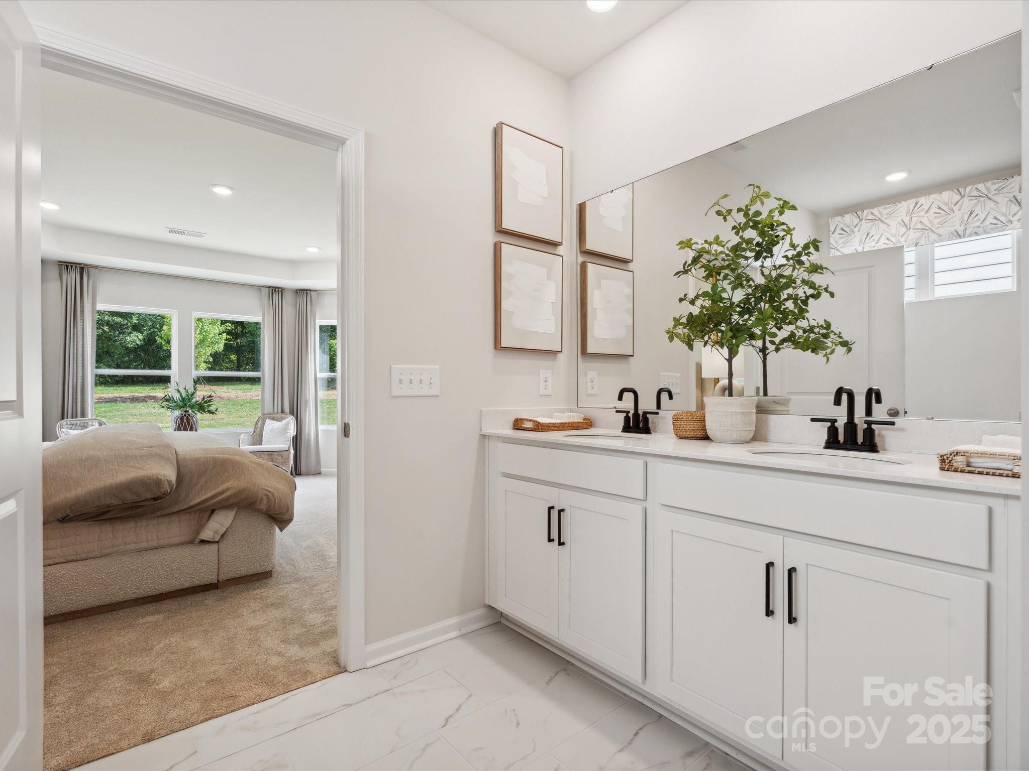 2012 Rosefield Court Matthews, NC 28104 - Photo 9 of 14 a bathroom with a sink and a mirror
