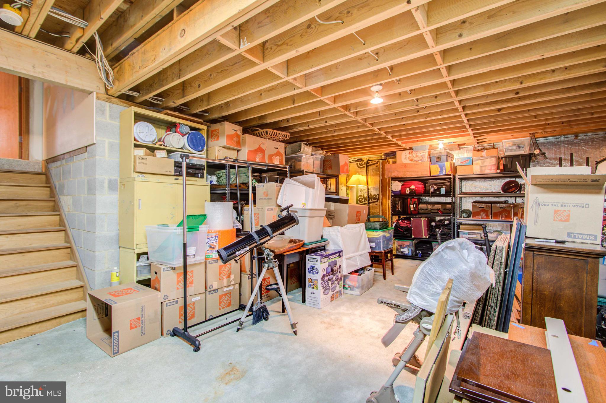 10610 Sweepstakes Road Damascus, MD 20872 - Photo 42 of 49 4th level storage with very high ceilings.