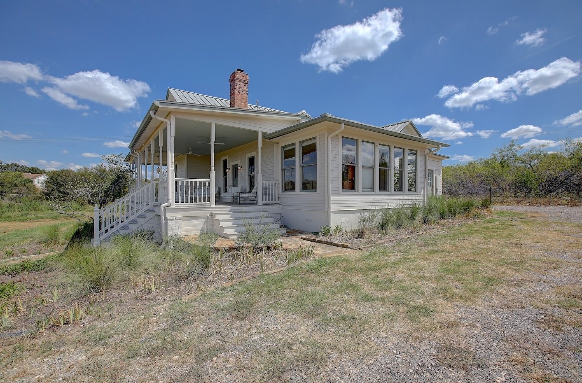 11228 Parsons Road Manor, TX 78653 - Photo 4 of 40 a front view of a house with a yard