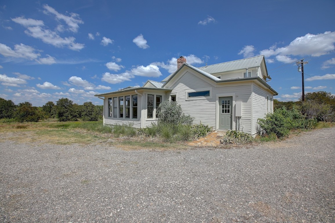 11228 Parsons Road Manor, TX 78653 - Photo 5 of 40 a view of house with a yard