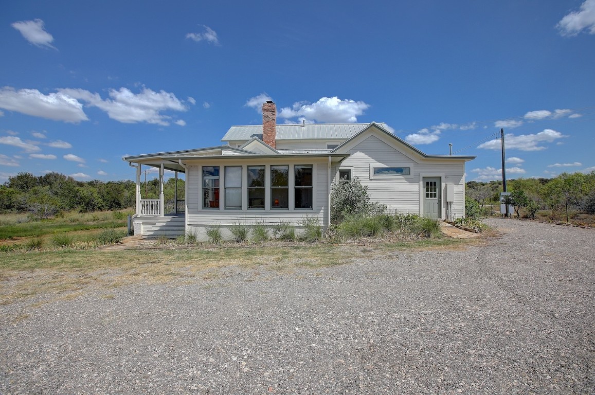 11228 Parsons Road Manor, TX 78653 - Photo 6 of 40 a front view of a house with a yard