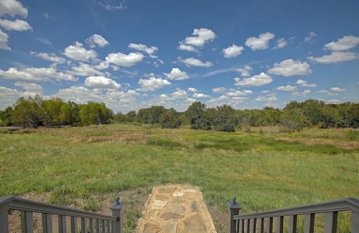 11228 Parsons Road Manor, TX 78653 - Photo 9 of 40 a view of a lake from a balcony