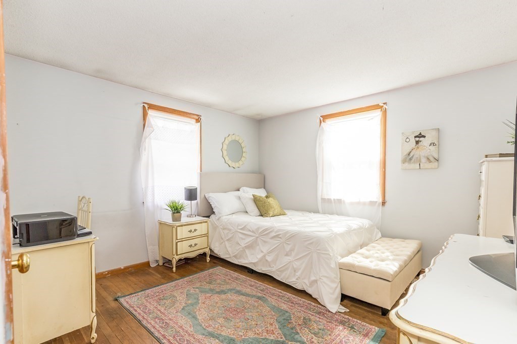 5 Harnden Road Billerica, MA 01821 - Photo 12 of 17 a bedroom with a bed and a window