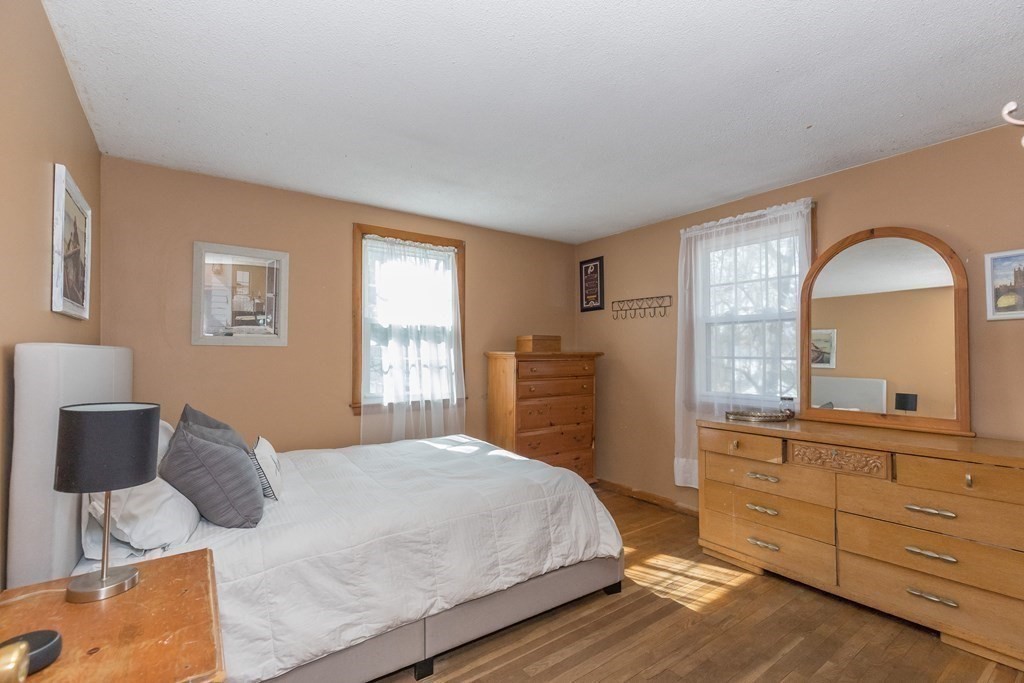 5 Harnden Road Billerica, MA 01821 - Photo 13 of 17 a bedroom with a large bed and a dresser