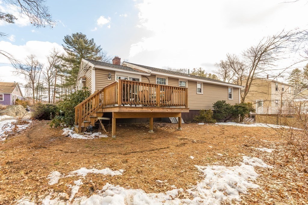 5 Harnden Road Billerica, MA 01821 - Photo 17 of 17 a house with trees in front of it