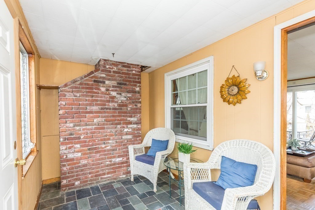 5 Harnden Road Billerica, MA 01821 - Photo 5 of 17 a view of a dining room with furniture a rug and wooden floor