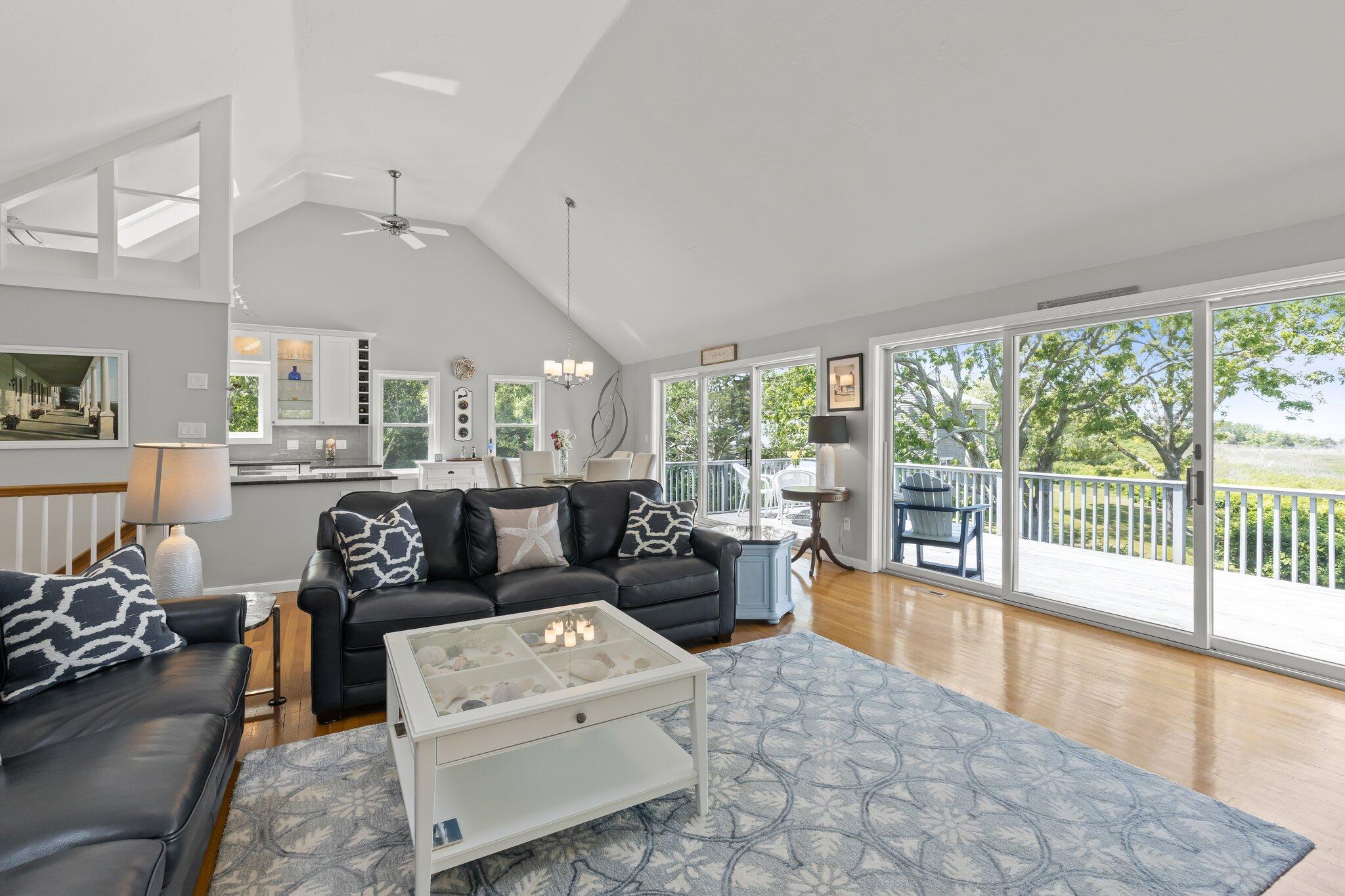 46 Captain Young Way Brewster, MA 02631 - Photo 12 of 44 Living Room w/ Cathedral Ceilings