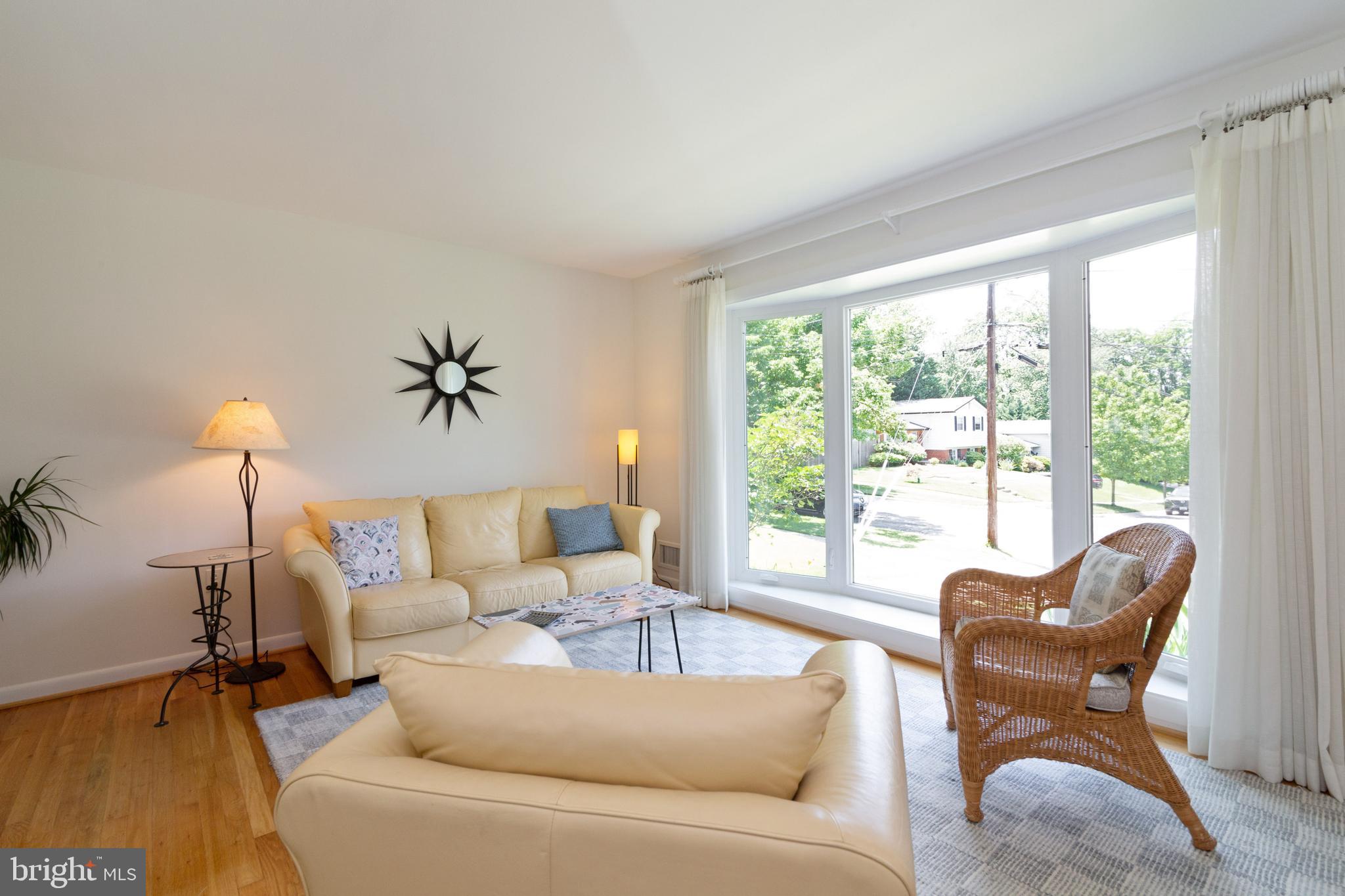 10107 Kohler Road Silver Spring, MD 20902 - Photo 3 of 34 Bright living room with bay window