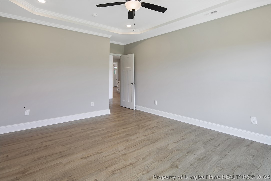 175 Spring Branch Road Tar Heel, NC 28392 - Photo 29 of 50 wooden floor in an empty room