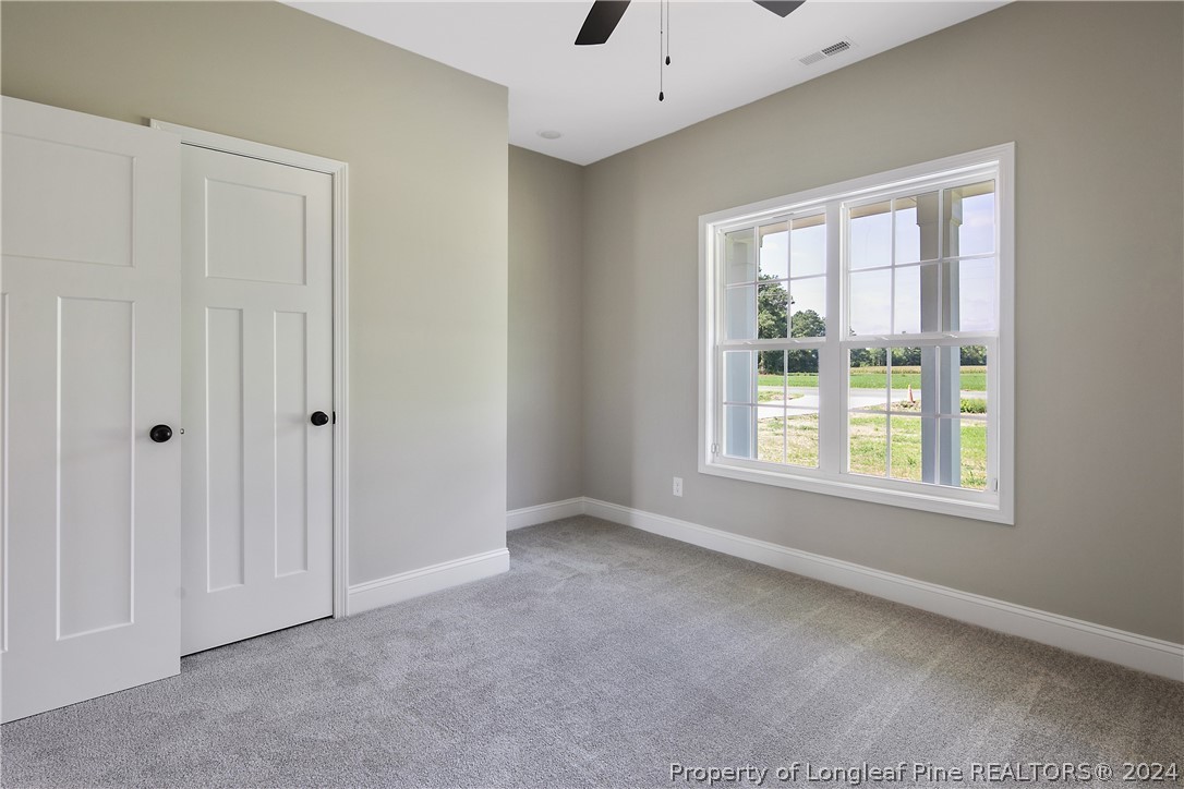 175 Spring Branch Road Tar Heel, NC 28392 - Photo 40 of 50 a view of an empty room with a window