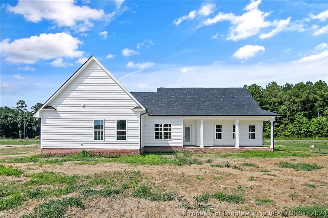 175 Spring Branch Road Tar Heel, NC 28392 - Photo 49 of 50 a view of a yard in front of a house with large tree