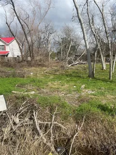a view of outdoor space with deck and yard