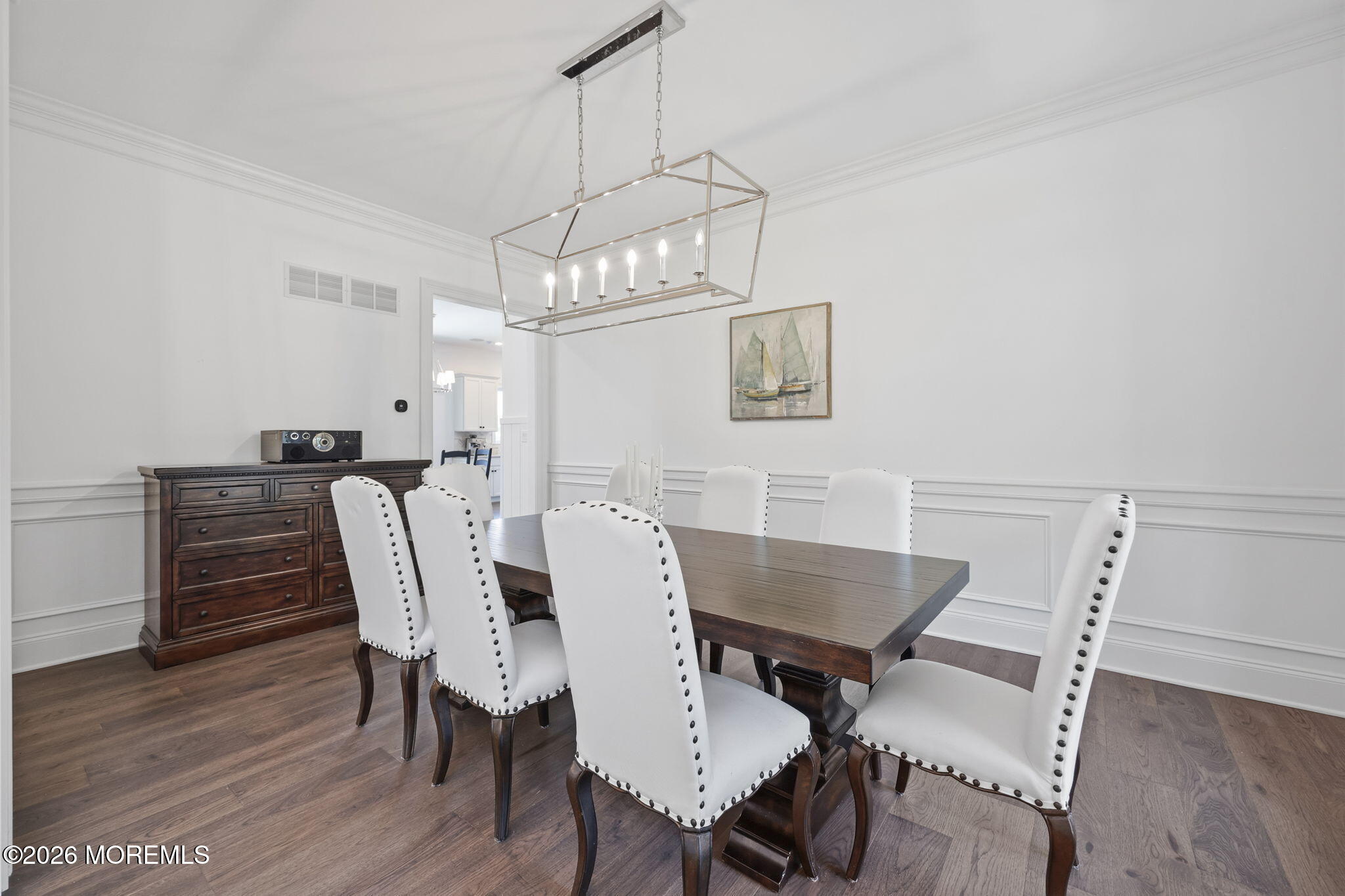66 Windermere Road Lincroft, NJ 07738 - Photo 18 of 48 a view of a dining room with furniture wooden floor and chandelier