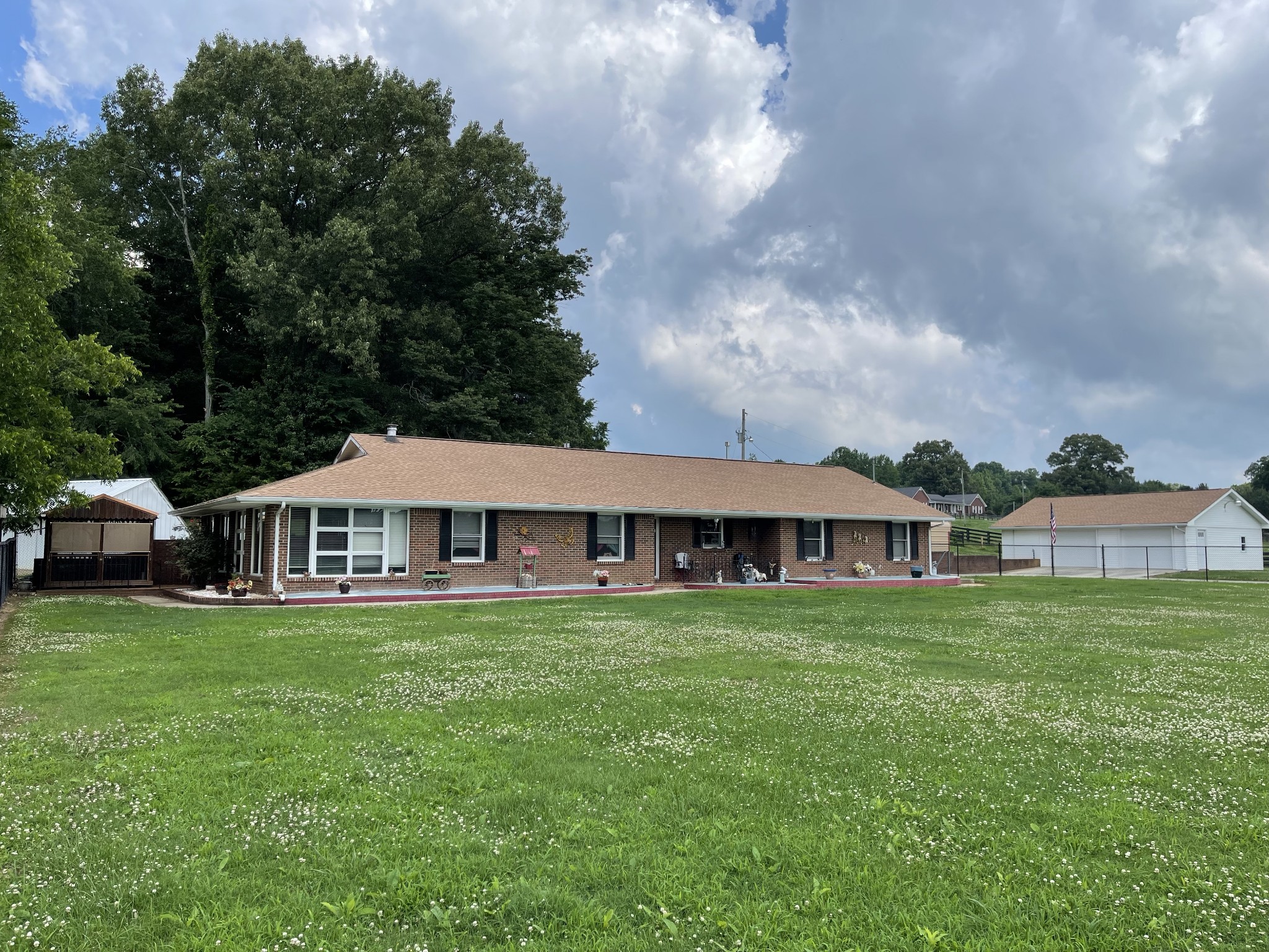 425 Corders Crossroads Road Fayetteville, TN 37334 - Photo 3 of 25 a view of a house with a big yard and large trees