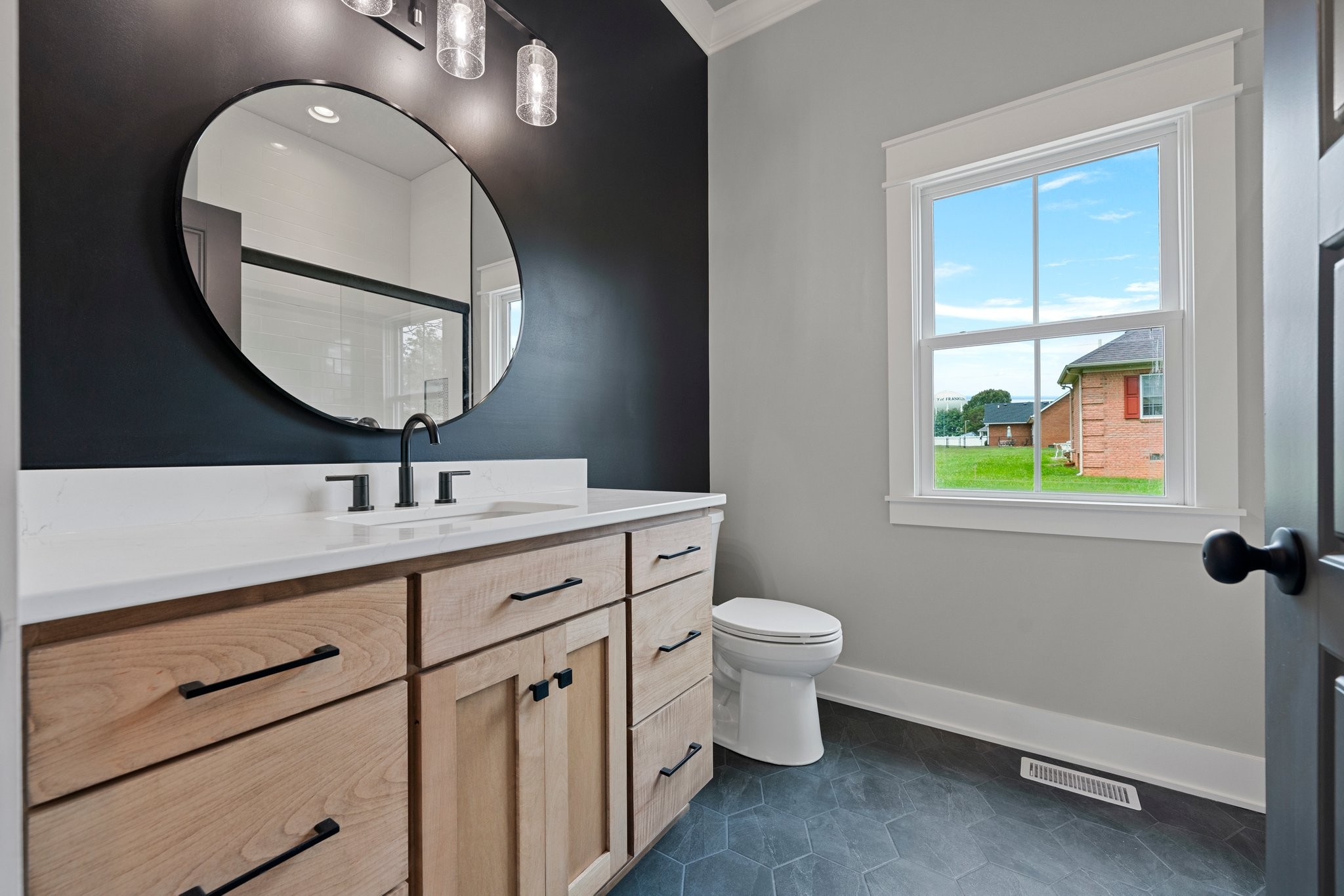 710 Rolling Rd Drive Franklin, KY 42134 - Photo 20 of 27 a bathroom with a toilet sink and mirror