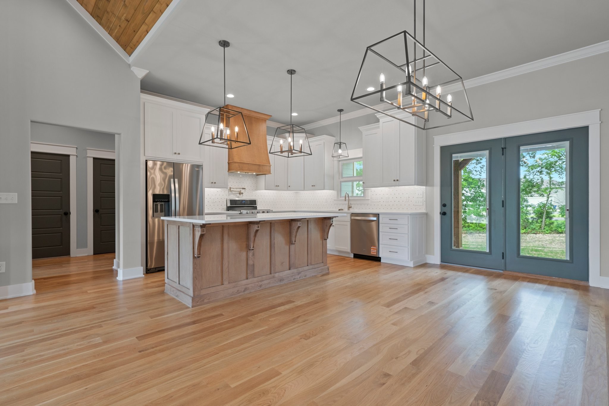 710 Rolling Rd Drive Franklin, KY 42134 - Photo 7 of 27 a view of a kitchen with a chandelier wooden floor and a chandelier