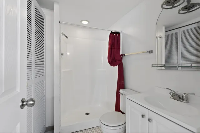 a bathroom with a sink and mirror